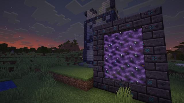 A lit Library portal at dusk